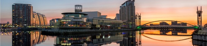 Sunset at Salford Quays in Avanti West Coast destination Manchester, UK.